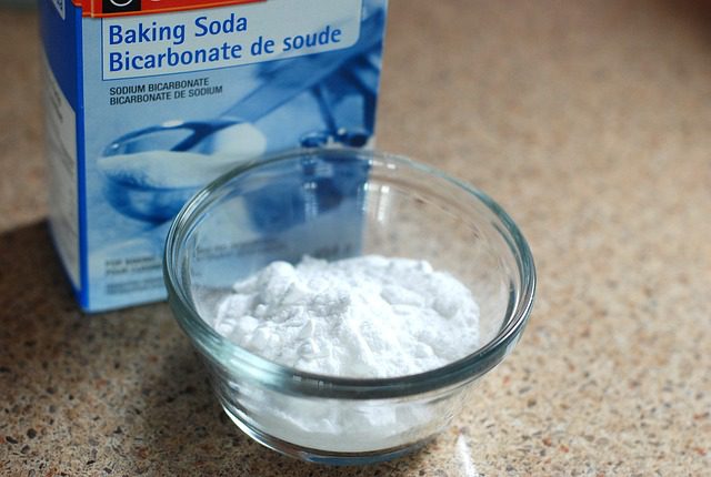 baking soda helps in removing black stains