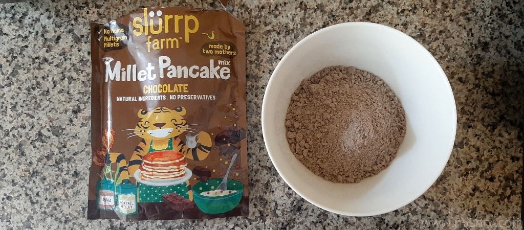 chocolate pancake dry instant mix powder in a ceramic bowl