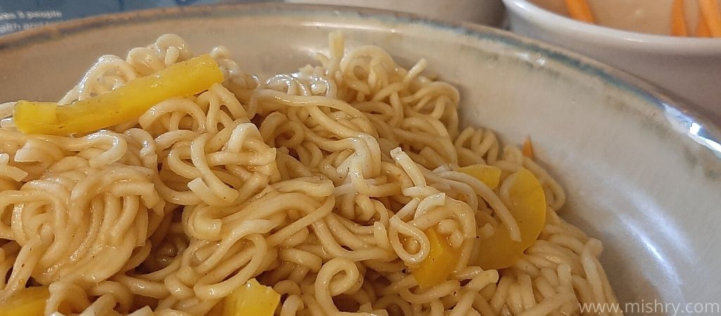 closer look at cooked little millet noodles in a plate