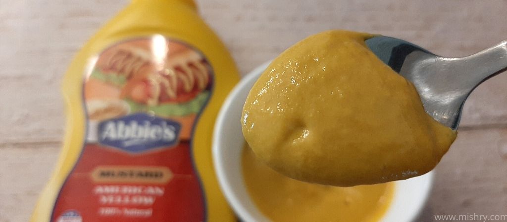 closer look at abbies squeeze mustard in a spoon