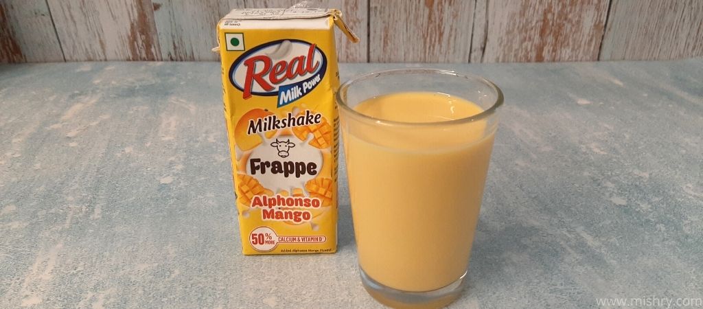alphonso mango milkshake in a glass