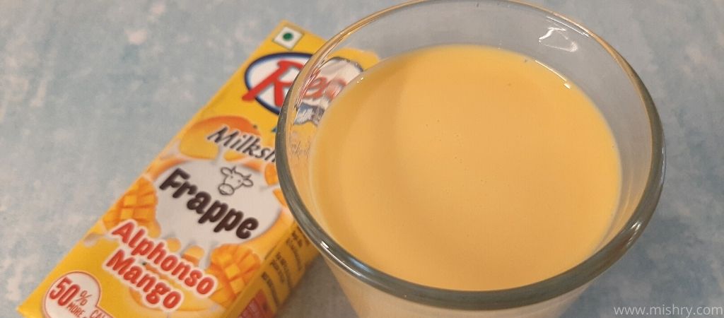 closer look at alphonso mango milkshake in a glass