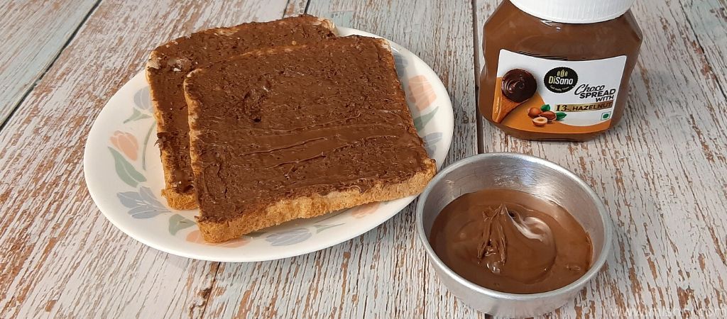 closer look at choco spread with hazelnut over bread slices