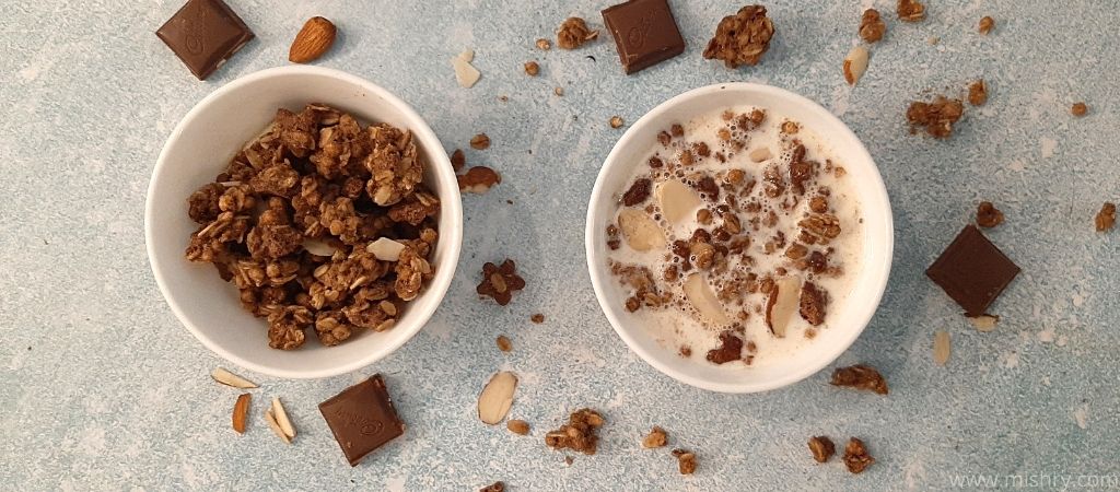 closer look at kellogs crunchy granola in a bowl after mixing with milk