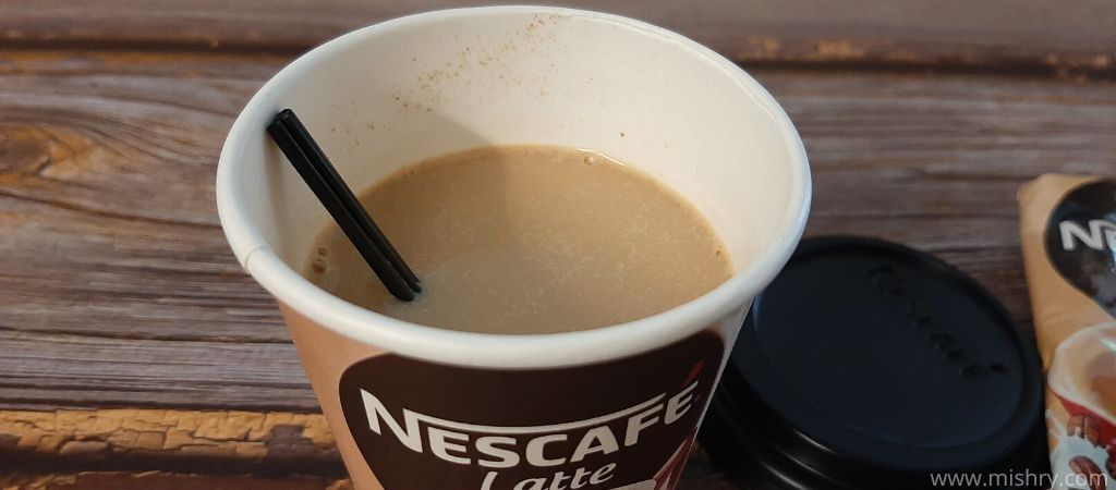 closer look at nescafe latte coffee in nescafe cup