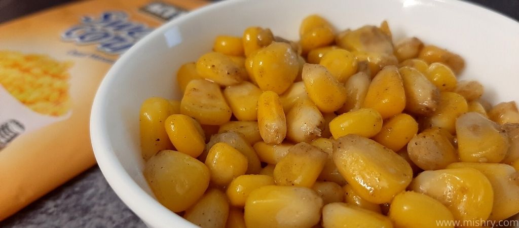 closer look at prepared chaat masala sweet corn in a bowl