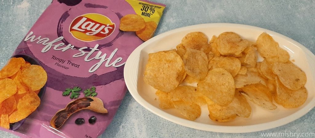 lays wafer style tangy treat chips on a plate