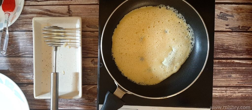 making omelet using the coil egg beater