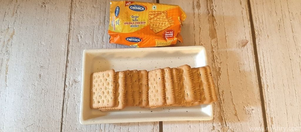 overhead look at cremica kalonji cracker biscuits on a tray