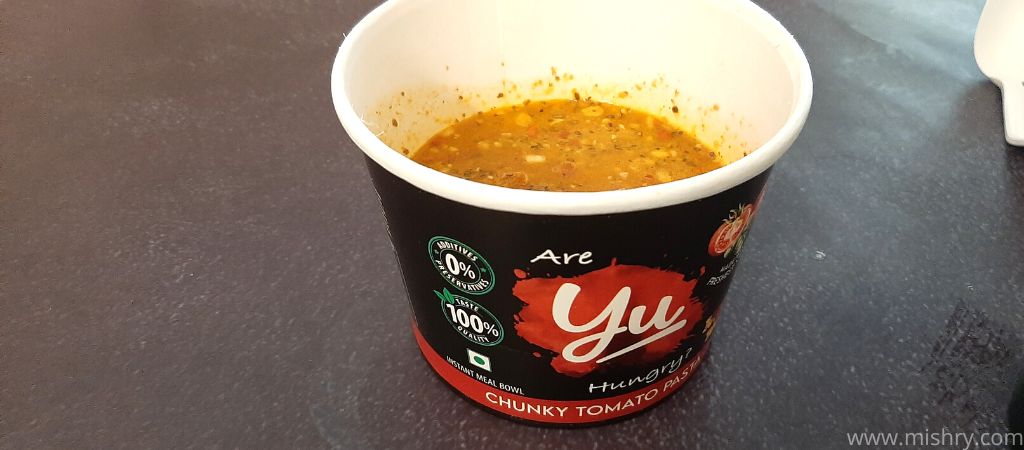 yu chunky tomato pasta and powder mixed in hot water