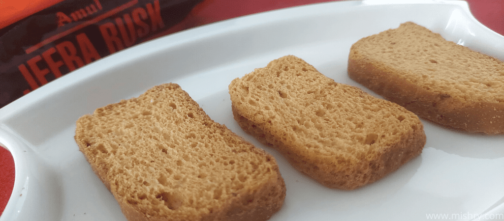 closer look at amul jeera rusk on a tray