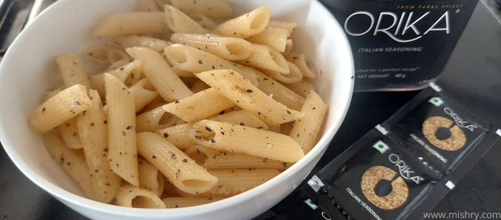 closer look at orika italian seasoning added in pasta