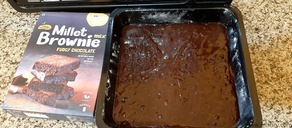 the brownie batter in the tin