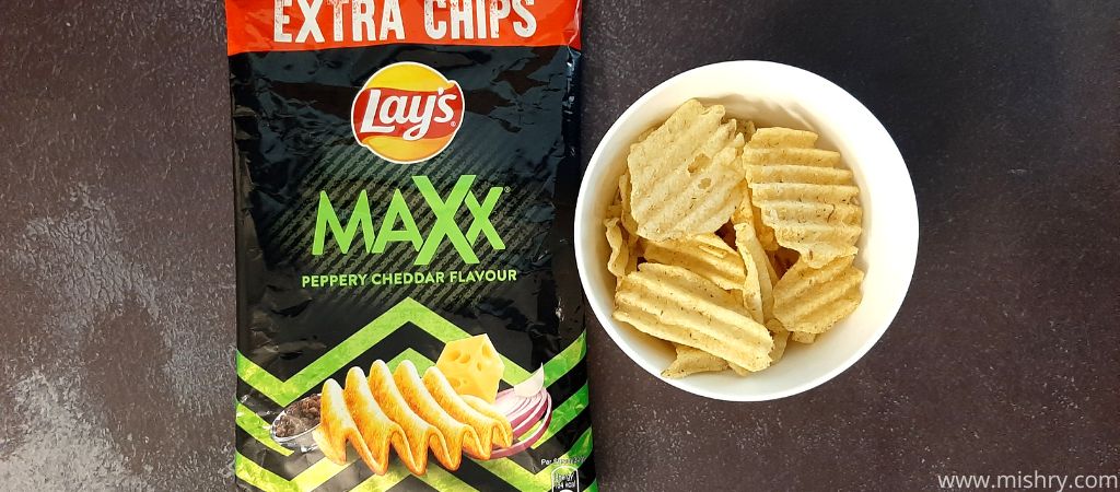 lays maxx peppery cheddar potato chips placed in a bowl