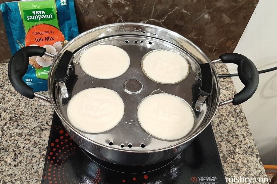 steaming our idlis using our stainless steel steamer