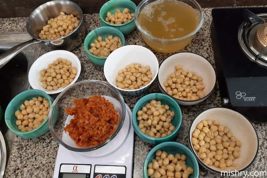weighing chana and masala for our testing