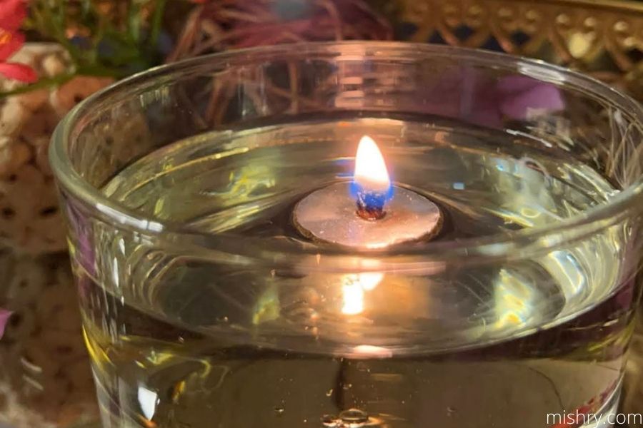 Here's a really quick and simple way to make a floating-wick oil