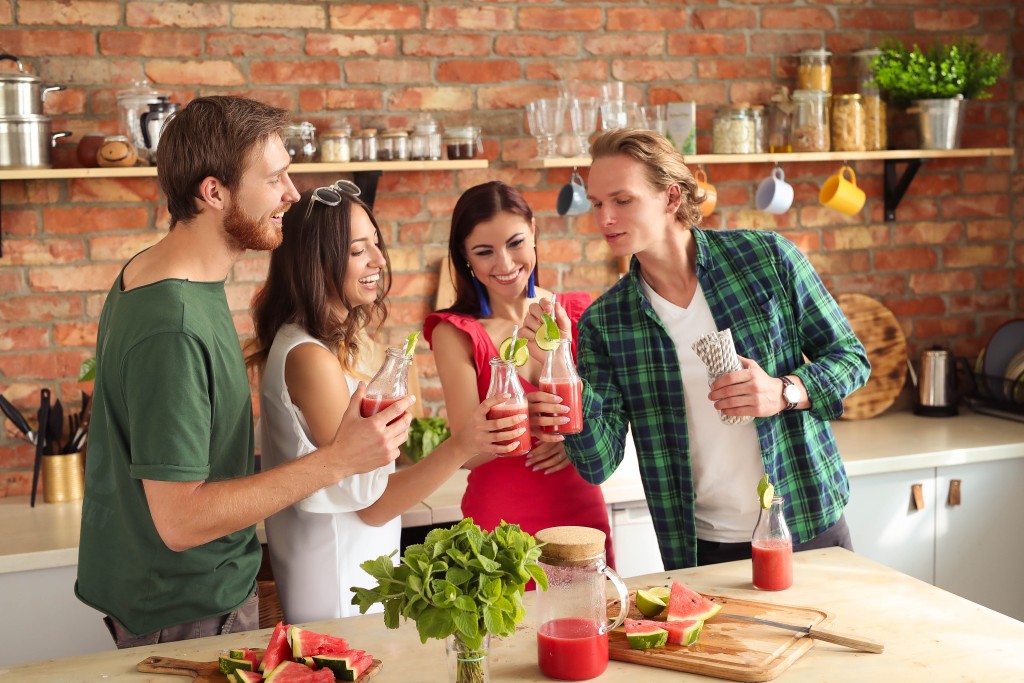 Group of people at kitchen